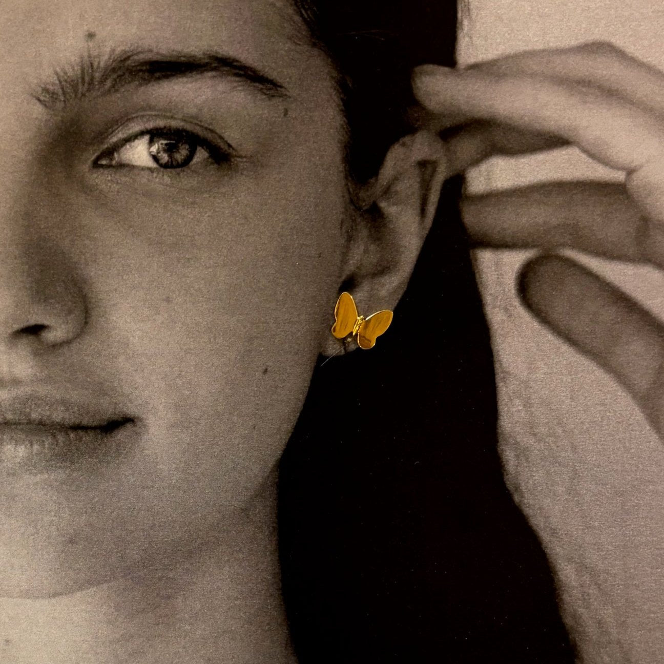 Flutterby Studs - Butterfly Earring Studs worn by a model, showcasing their whimsical design.