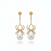 Pair of earrings with pearl-like stones 