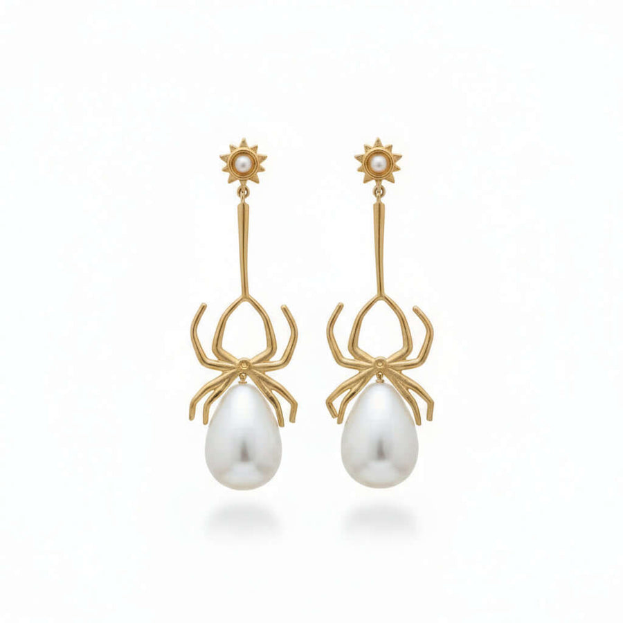 Pair of earrings with pearl-like stones 
