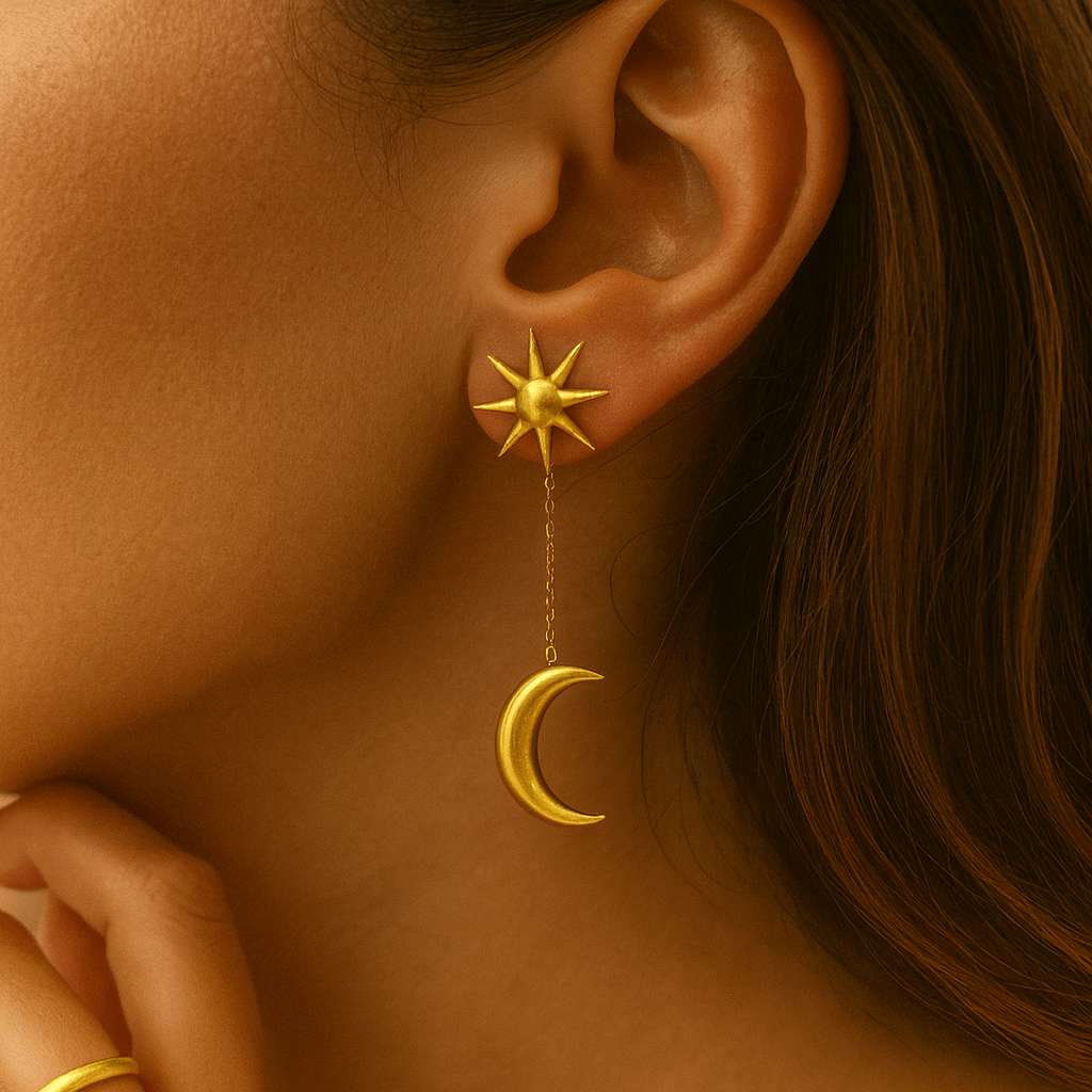 Ray of Light Earrings featuring a sun and moon design, showcased elegantly on a model's ear.