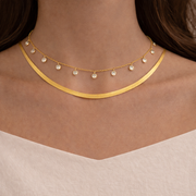 Close-up of the Celeste Diamond Necklace featuring cubic zircon diamonds on a gold chain for everyday elegance.