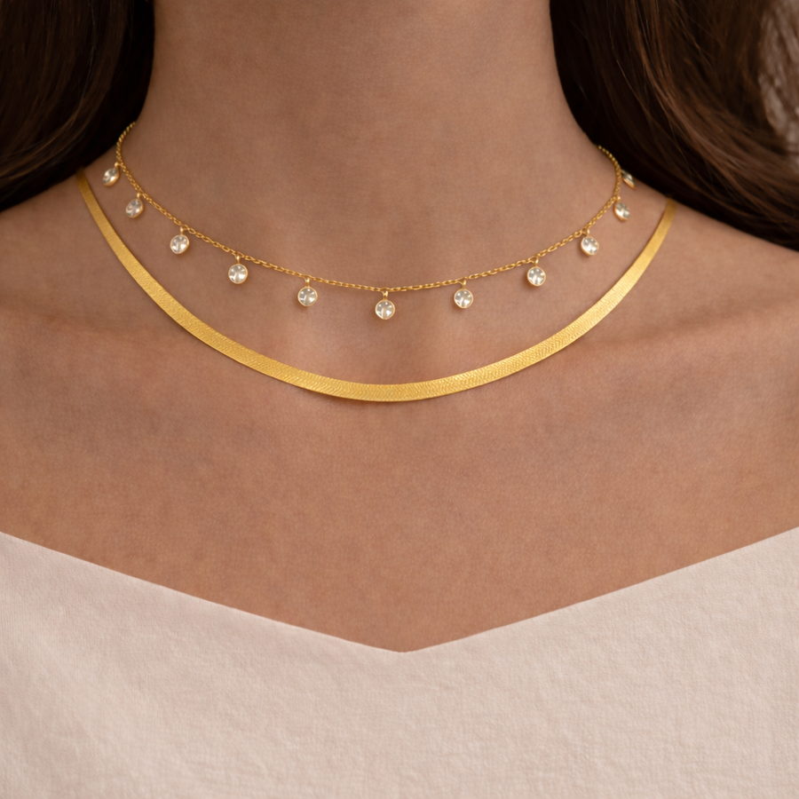 Close-up of the Celeste Diamond Necklace featuring cubic zircon diamonds on a gold chain for everyday elegance.