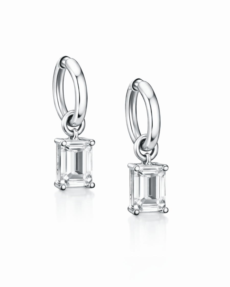 Everyday diamond earrings featuring high-grade cubic zirconia suspended from lightweight silver hoops.