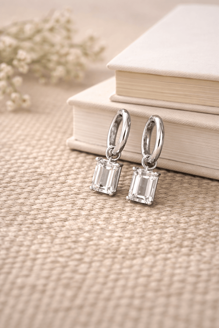 Everyday diamond earrings featuring high-grade cubic zirconia in a sleek silver hoop design.