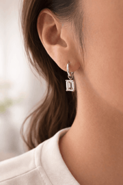 Everyday diamond earrings featuring a silver hoop and a high-grade cubic zircon diamond drop.