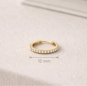Everyday Diamond Huggies, 12 mm gold hoop earring with tiny cubic zirconia stones for a subtle shine.