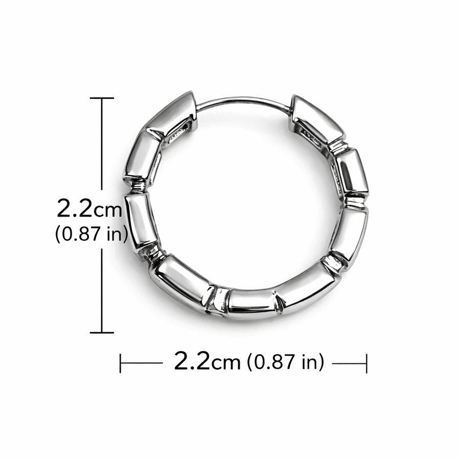 Silver hoop earring with measurements on a white background