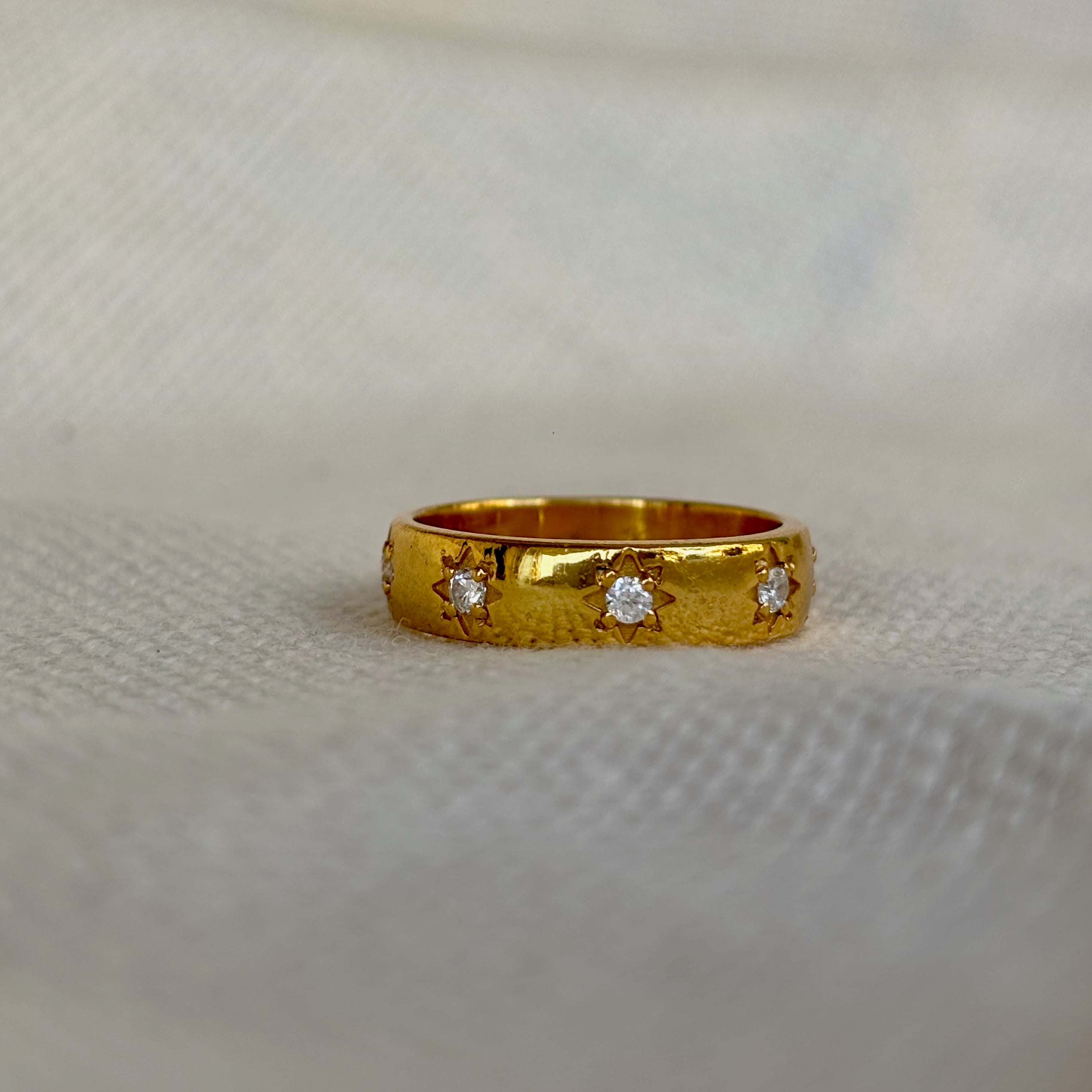 Stardust Diamond Band featuring three sparkling diamonds set in a gold vermeil finish.