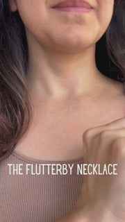 Butterfly necklace being worn